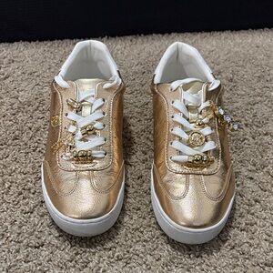 Michael Kors women’s Metallic Leather Gold Sneakers